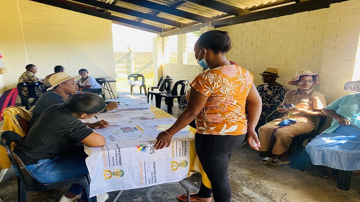 Sassa officials provide services for SRD clients at a KZN community hall