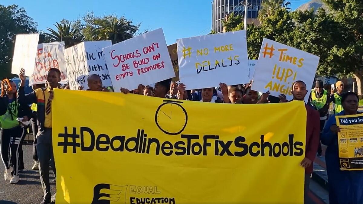Equal Education protesting with students regarding the proposed changes to school infrastructure laws